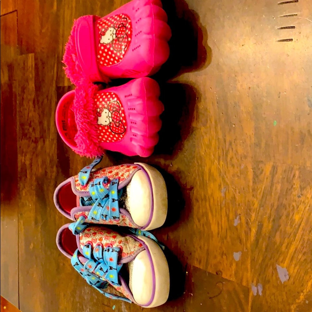 Two pairs of Hello Kitty children’s shoes